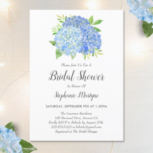 Blue hydrangea bridal shower invitation with modern watercolor blue hydrangea bouquet with foliage and script typography.