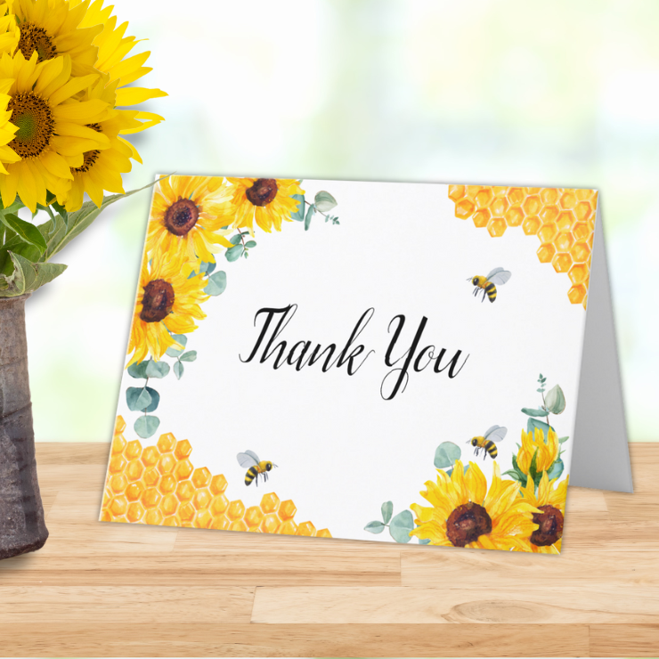 Bridal shower folded thank you card with watercolor honeycomb, bees, sunflowers and eucalyptus foliage.